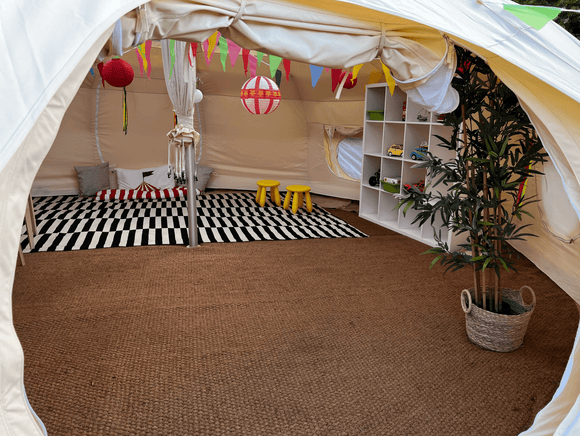 Tent Flooring - image of some Coir Matting installed in a luxury, canvas belle tent. A great way to add some extra luxury and insulation on your camping trips. Lotus Belle